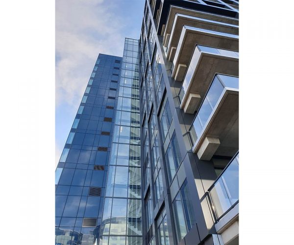 glass exterior of a large high rise building